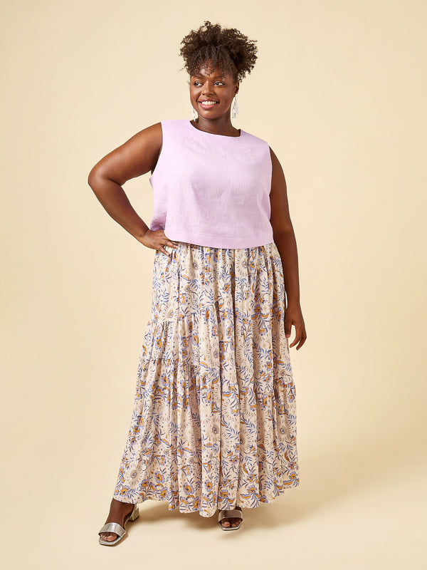 Plus-size sewn sample of the Azure skirt sewing pattern by Closet Core Patterns, tiered floral skirt and lilac sleeveless top, front view.