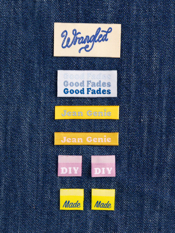 Jeans Sewing Labels Multipack by Closet Core Patterns, woven Wrangled, Good Fades, Jean Genie, DIY and Made labels on denim.