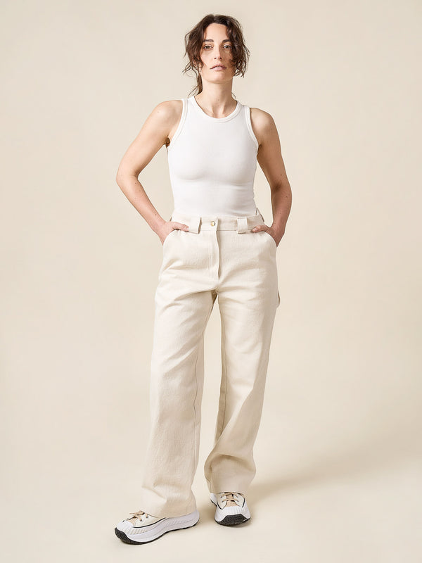Sewn sample of the Rika pants sewing pattern by Closet Core Patterns in cream denim, front view with belt loops.