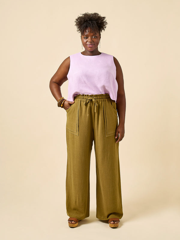 Plus-size sewn sample of the Sepia pants + shorts sewing pattern by Closet Core Patterns in olive linen, front view with patch pockets.