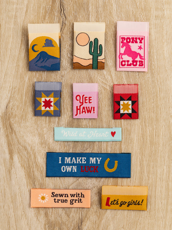 Ten woven Western sewing labels by Closet Core Patterns, including desert, Pony Club, Yee Haw and I Make My Own Luck designs.