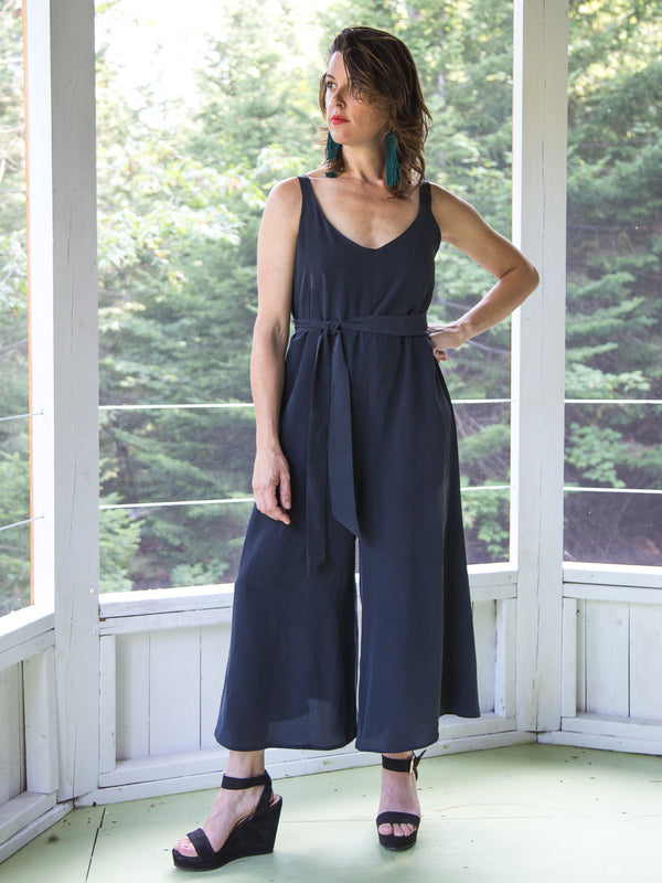 Sewn sample of the Amy jumpsuit sewing pattern by Closet Core Patterns in navy, front view with V-neckline and wide legs.