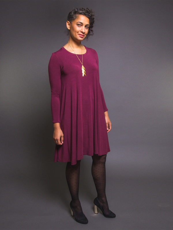 Sewn sample of the Ebony T-shirt + knit dress sewing pattern by Closet Core Patterns in burgundy knit, front view with long sleeves.
