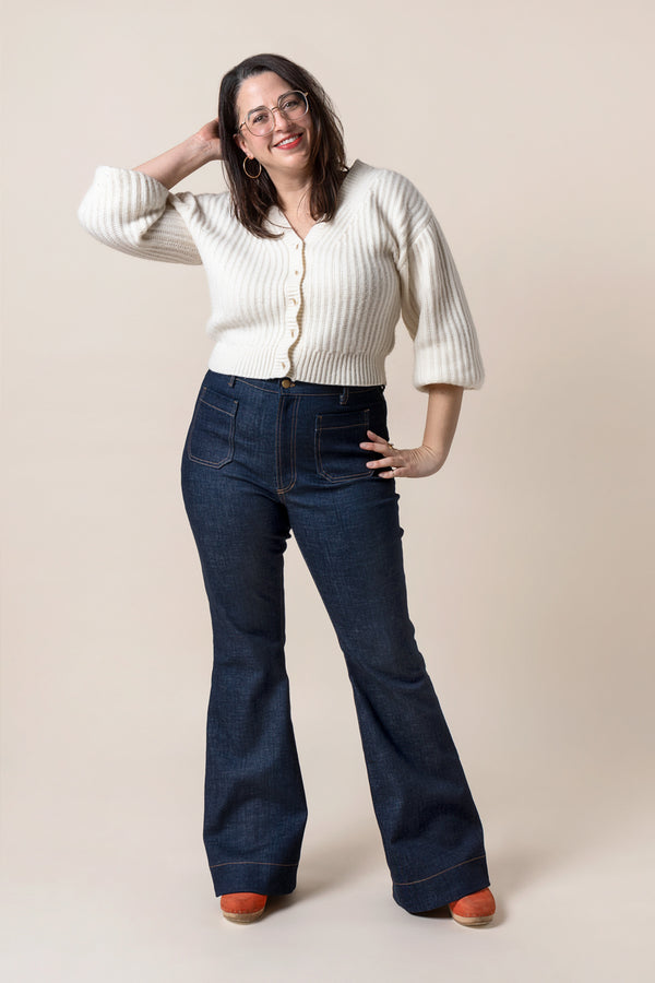 Sewn sample of the Jude flare jeans sewing pattern by Closet Core Patterns in dark denim, front view with patch pockets.