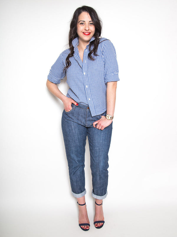 Sewn sample of the Morgan jeans sewing pattern by Closet Core Patterns in mid-blue denim, front view with cuffed hems.